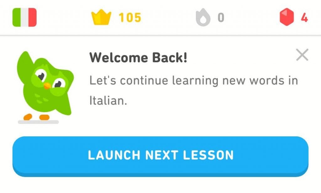 The Duolingo owl waves at the top of the screen next to the words 'Welcome back!' above a button that says 'launch next lesson'