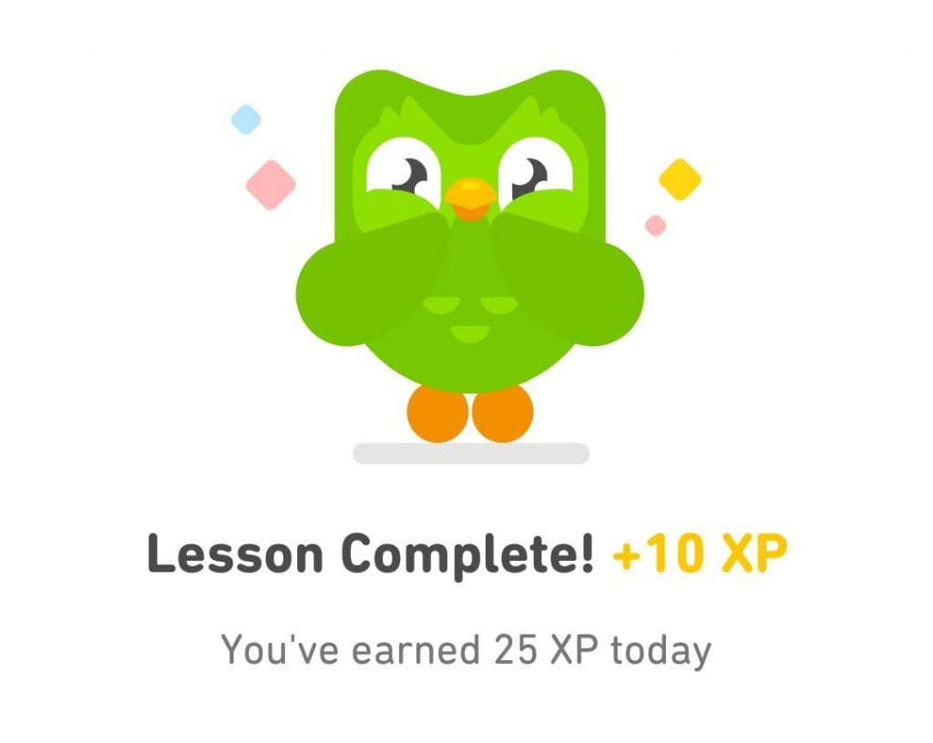The Duolingo owl beams with pride over the words 'Lesson Complete! +10 XP. You've earned 25 XP today'